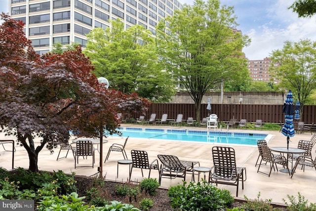 4100 N Charles St Unit 203, Baltimore, MD 21218 - community pool featuring a patio