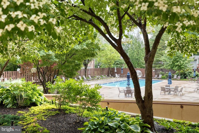 4100 N Charles St Unit 203, Baltimore, MD 21218 - community pool featuring a patio