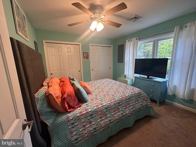 25 N 12th St, Del Haven, NJ 08251 - carpeted bedroom featuring multiple closets, a ceiling fan, baseboards, and electric panel