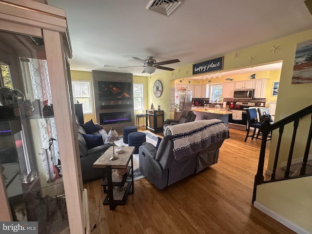 25 N 12th St, Del Haven, NJ 08251 - living area with wood finished floors and ceiling fan