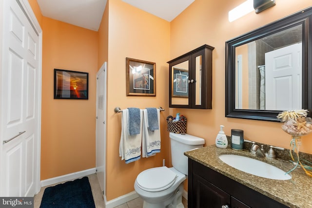 25 N 12th St, Del Haven, NJ 08251 - bathroom with toilet, vanity, a shower, tile patterned flooring, and baseboards