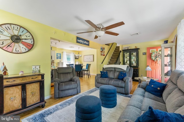 25 N 12th St, Del Haven, NJ 08251 - living room featuring stairway, wood finished floors, and ceiling fan