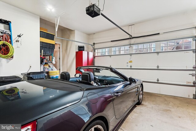 47666 Paulsen Sq, Potomac Falls, VA 20165 - garage featuring a garage door opener