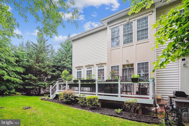 47666 Paulsen Sq, Potomac Falls, VA 20165 - rear view of house with a yard and a wooden deck