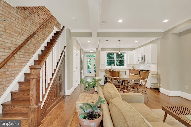 539 Shepherd St NW, Washington, DC 20011 - living area with light wood-style floors, stairway, recessed lighting, baseboards, and ornamental molding