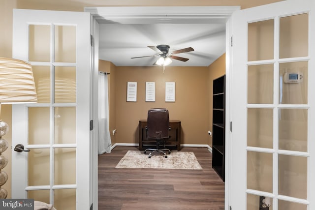 6 E Saxony Dr, New Castle, DE 19720 - home office with dark wood-style floors, ceiling fan, and baseboards