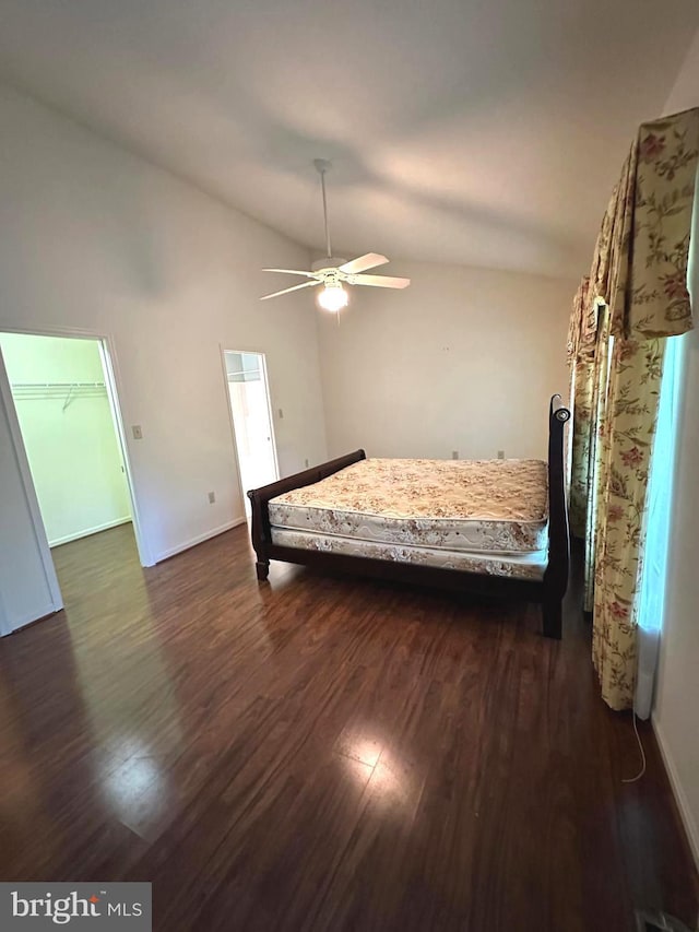 413 Park View Dr, Harrisburg, PA 17110 - bedroom featuring dark wood finished floors, vaulted ceiling, baseboards, and ceiling fan