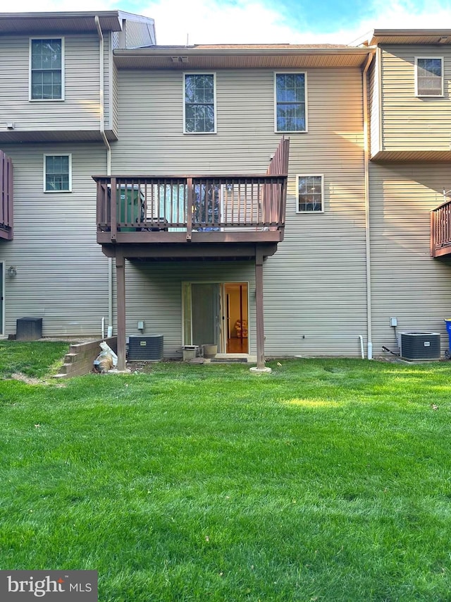 413 Park View Dr, Harrisburg, PA 17110 - back of house with cooling unit, a lawn, and a wooden deck