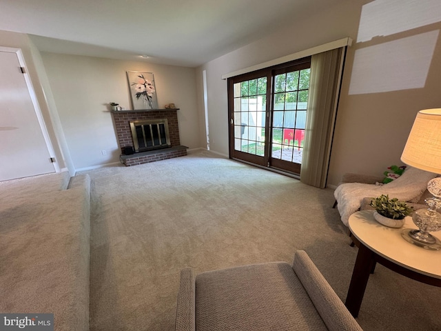 315 S Valley Forge Rd Unit 7, Devon, PA 19333 - carpeted living room featuring a fireplace and baseboards