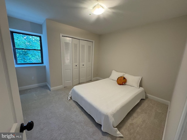 315 S Valley Forge Rd Unit 7, Devon, PA 19333 - bedroom featuring light carpet, a closet, and baseboards