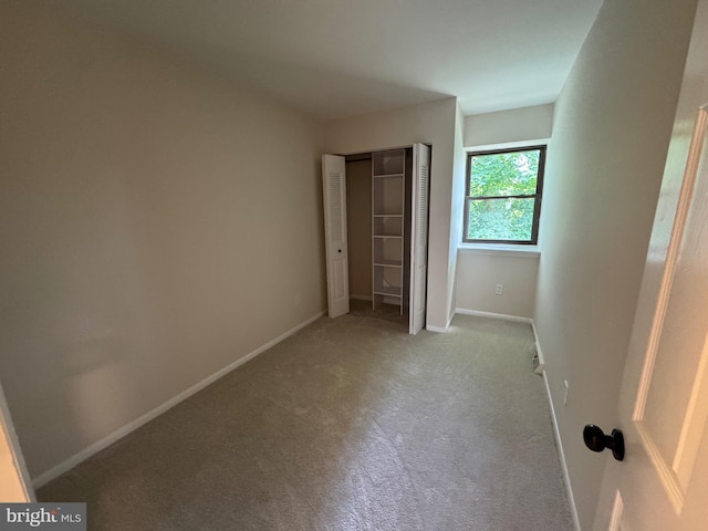 315 S Valley Forge Rd Unit 7, Devon, PA 19333 - unfurnished bedroom featuring baseboards, carpet, and a closet