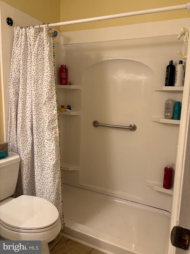 43 Magnolia Rd, Manahawkin, NJ 08050 - full bathroom featuring toilet and a shower with shower curtain