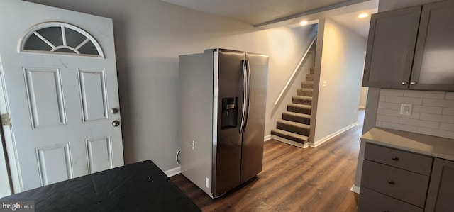 538 Mcmechen St, Baltimore, MD 21217 - entrance foyer with stairway, baseboards, and dark wood-style flooring