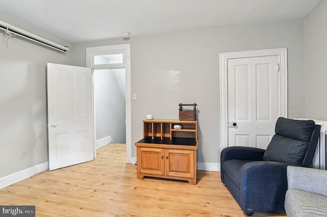 134 N Plum St, Lancaster, PA 17602 - sitting room with light wood finished floors and baseboards