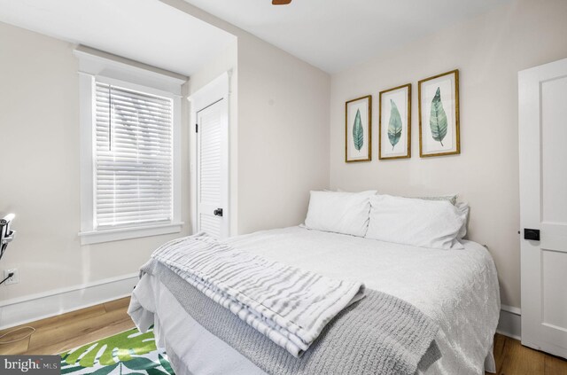 27 E Groveland Ave, Somers Point, NJ 08244 - bedroom with wood finished floors, baseboards, and ceiling fan