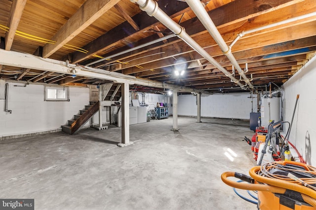 27 E Groveland Ave, Somers Point, NJ 08244 - below grade area featuring stairway, water heater, and concrete block wall
