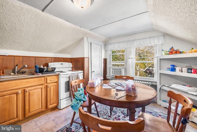 27 E Groveland Ave, Somers Point, NJ 08244 - dining room with a textured ceiling, vaulted ceiling, and cooling unit