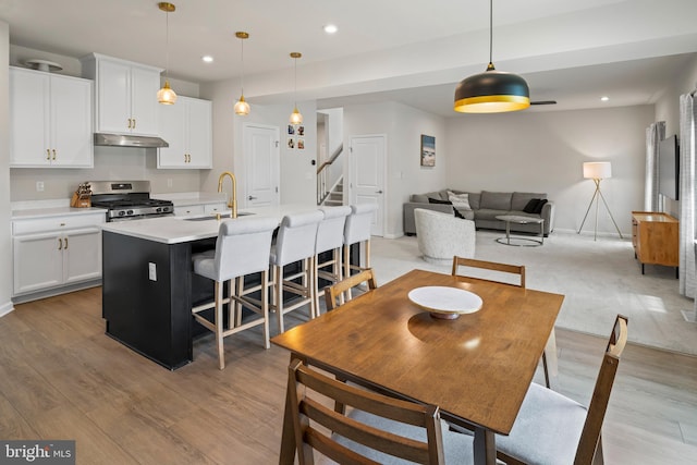 138 Merseyside Dr, Woolwich Twp, NJ 08085 - dining room featuring recessed lighting, stairs, light wood finished floors, and baseboards