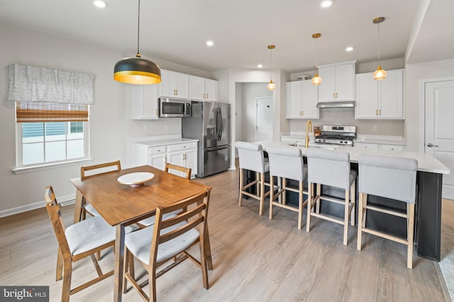 138 Merseyside Dr, Woolwich Twp, NJ 08085 - dining room featuring light wood-style floors, recessed lighting, and baseboards