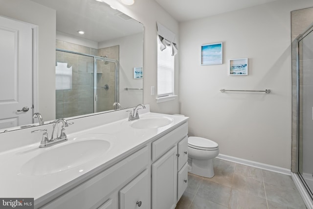 138 Merseyside Dr, Woolwich Twp, NJ 08085 - full bathroom featuring a stall shower, double vanity, toilet, and baseboards