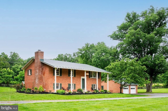 1170 Parker St, Upperville, VA 20184 - view of front of house featuring brick siding, a chimney, a standing seam roof, an outbuilding, and a metal roof