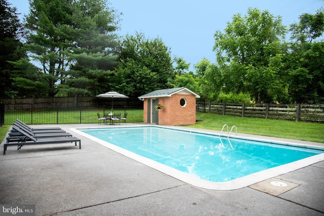 1170 Parker St, Upperville, VA 20184 - view of swimming pool with a patio area, a fenced backyard, an outbuilding, and view of scattered trees