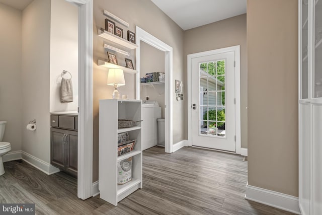 500 Prince George Dr, Lancaster, PA 17601 - foyer entrance with dark wood-style flooring, washer / clothes dryer, and baseboards