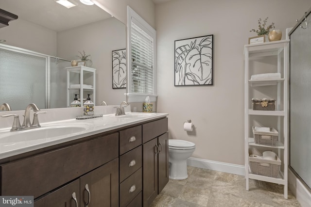 500 Prince George Dr, Lancaster, PA 17601 - full bath with a shower with shower door, double vanity, toilet, and baseboards