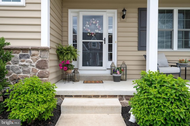 500 Prince George Dr, Lancaster, PA 17601 - doorway to property featuring covered porch and stone siding