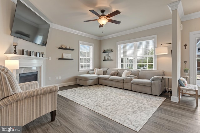 500 Prince George Dr, Lancaster, PA 17601 - living room with baseboards, wood finished floors, ornamental molding, a ceiling fan, and a premium fireplace