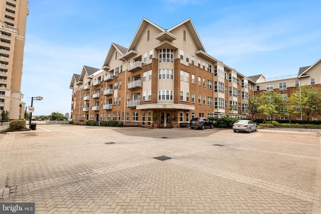 23 Pierside Dr Unit 429, Baltimore, MD 21230 - view of building exterior featuring uncovered parking