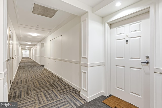 23 Pierside Dr Unit 429, Baltimore, MD 21230 - hallway with carpet flooring and a decorative wall