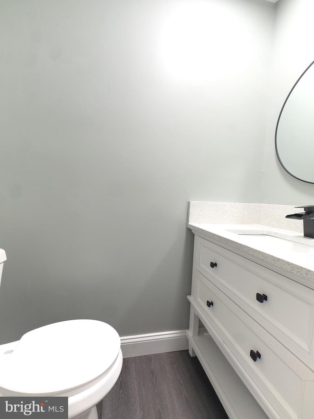 1736 E 30th St, Baltimore, MD 21218 - bathroom featuring vanity and wood finished floors