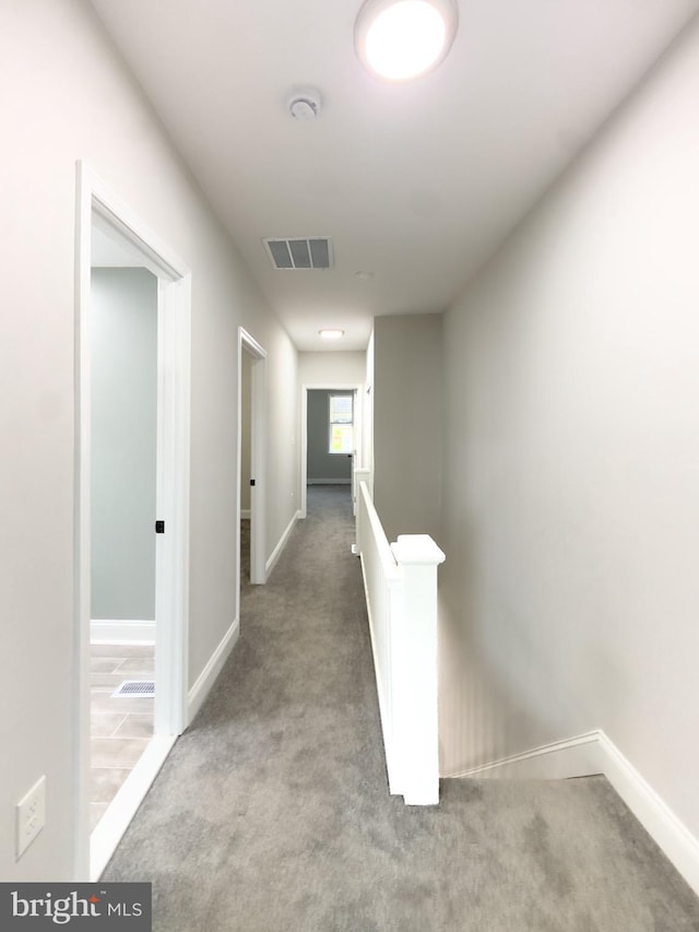1736 E 30th St, Baltimore, MD 21218 - hall featuring carpet flooring and an upstairs landing