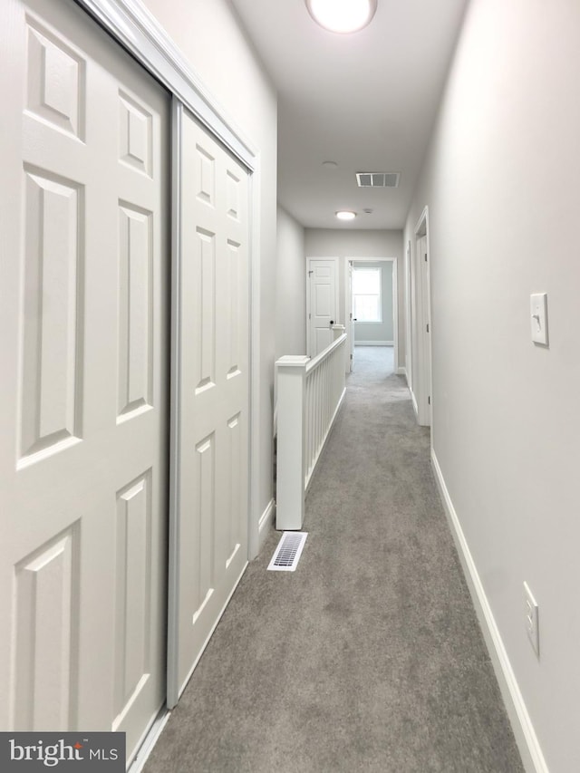 1736 E 30th St, Baltimore, MD 21218 - hallway featuring carpet and baseboards