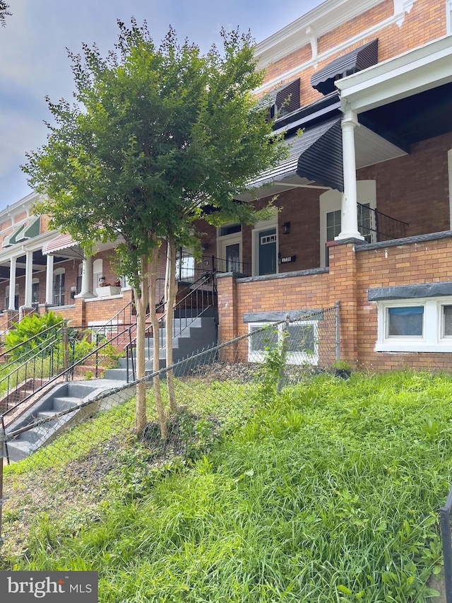 1736 E 30th St, Baltimore, MD 21218 - view of property featuring stairs