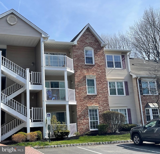 82 Cheverny Ct, Hamilton, NJ 08619 - view of building exterior with uncovered parking