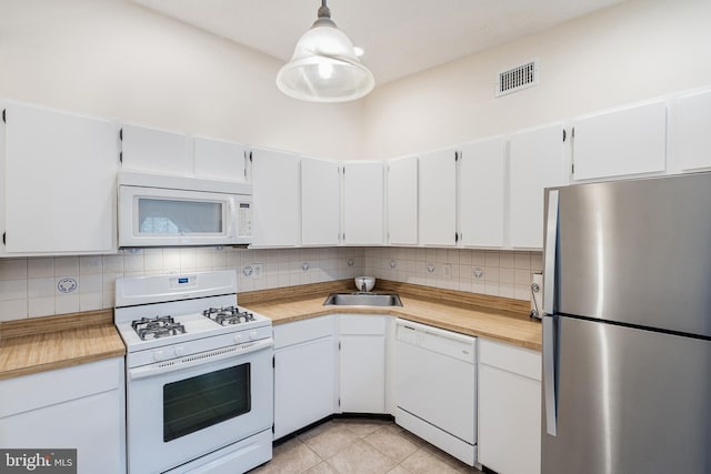 82 Cheverny Ct, Hamilton, NJ 08619 - kitchen featuring white appliances, a sink, tasteful backsplash, and light tile patterned flooring