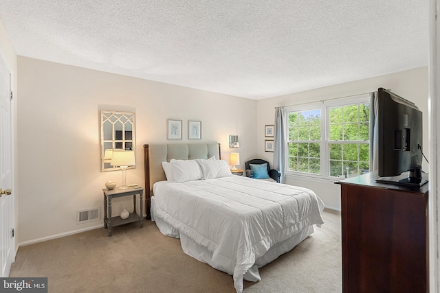 82 Cheverny Ct, Hamilton, NJ 08619 - bedroom with light carpet, a textured ceiling, and baseboards