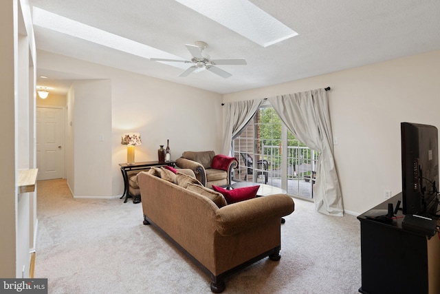 82 Cheverny Ct, Hamilton, NJ 08619 - living room with carpet, a skylight, ceiling fan, and baseboards