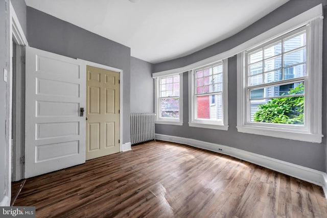 36 N Millbourne Ave, Upper Darby, PA 19082 - entrance foyer with radiator, baseboards, and dark wood-style flooring