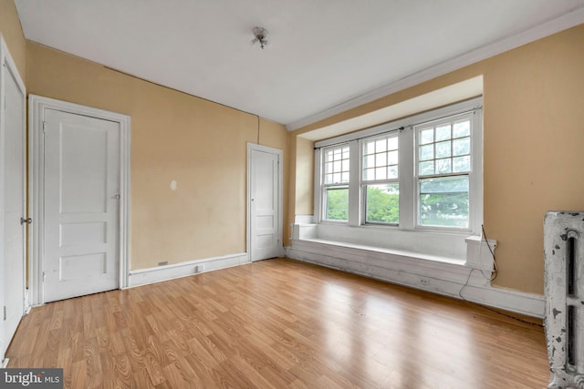 36 N Millbourne Ave, Upper Darby, PA 19082 - unfurnished living room with light wood-style floors and baseboards