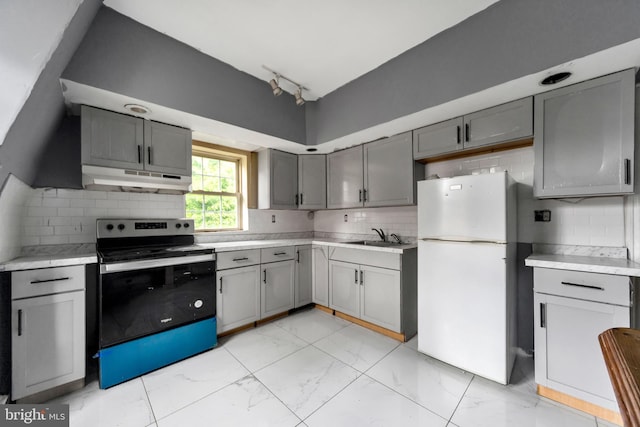 36 N Millbourne Ave, Upper Darby, PA 19082 - kitchen with stainless steel electric range, freestanding refrigerator, gray cabinets, light marble finish floors, and under cabinet range hood