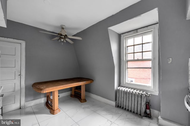 36 N Millbourne Ave, Upper Darby, PA 19082 - recreation room featuring radiator heating unit, baseboards, a ceiling fan, and light marble finish floors