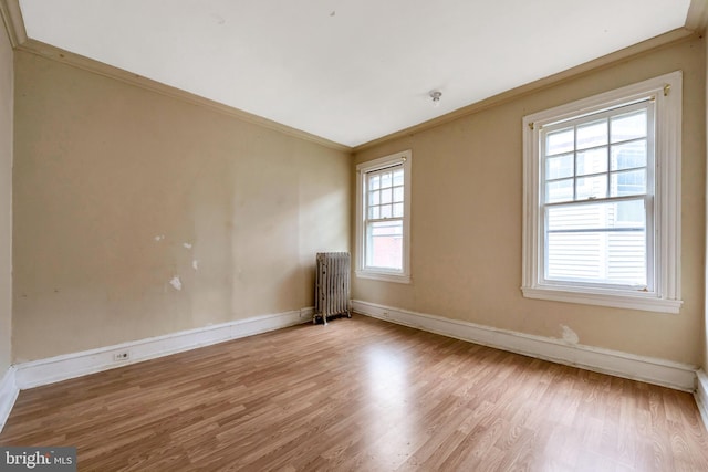 36 N Millbourne Ave, Upper Darby, PA 19082 - unfurnished room with radiator, ornamental molding, wood finished floors, and baseboards