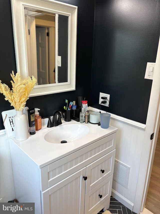 3258 N 48th St, Pennsauken, NJ 08109 - bathroom featuring vanity and a wainscoted wall