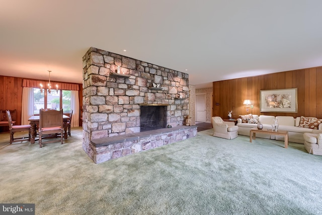 1545 Farr Rd, Wyomissing, PA 19610 - carpeted living area with wood walls, a chandelier, and a fireplace