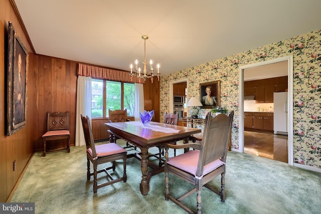 1545 Farr Rd, Wyomissing, PA 19610 - dining area with wallpapered walls, a chandelier, light colored carpet, and baseboards