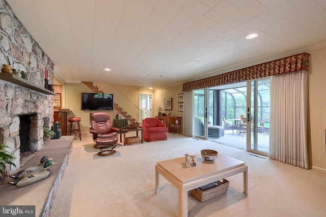 1545 Farr Rd, Wyomissing, PA 19610 - carpeted living room with a stone fireplace, stairway, and crown molding