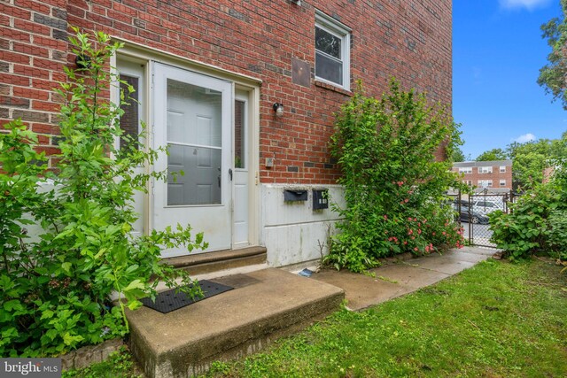 210 Erica Ter, Philadelphia, PA 19116 - view of exterior entry with brick siding and a gate